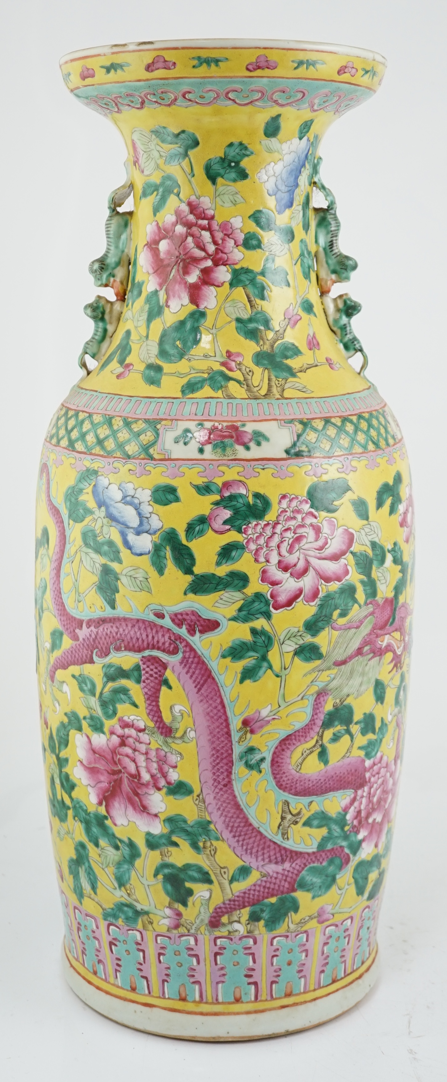 A tall Chinese Straits yellow ground ‘dragon’ vase, 19th century, rim chips